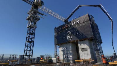 Time-lapse cameras on cranes and scaffolding