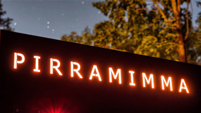 Pirramimma sign illuminated through the steel structure during construction