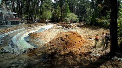 Lake and rock landscaping under construction at Pirramimma