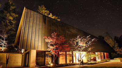 Boutique building at night.