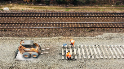 Railway tracks being laid.