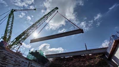Large bridge girders under construction.