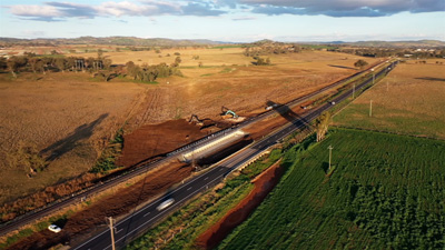 Aerial of railway bridge construction in regional NSW.