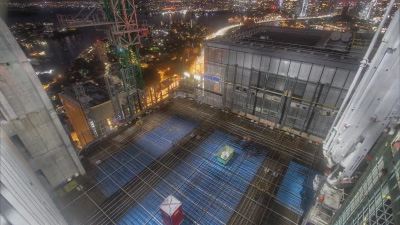 High-end time-lapse camera installed on a construction site crane